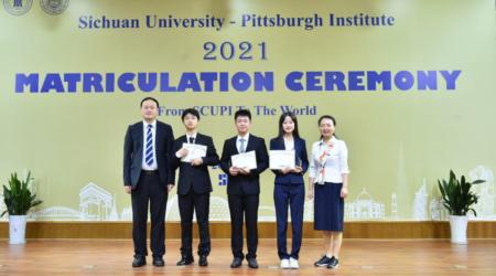 图为获奖员工与校领导、学院领导及教师代表合影